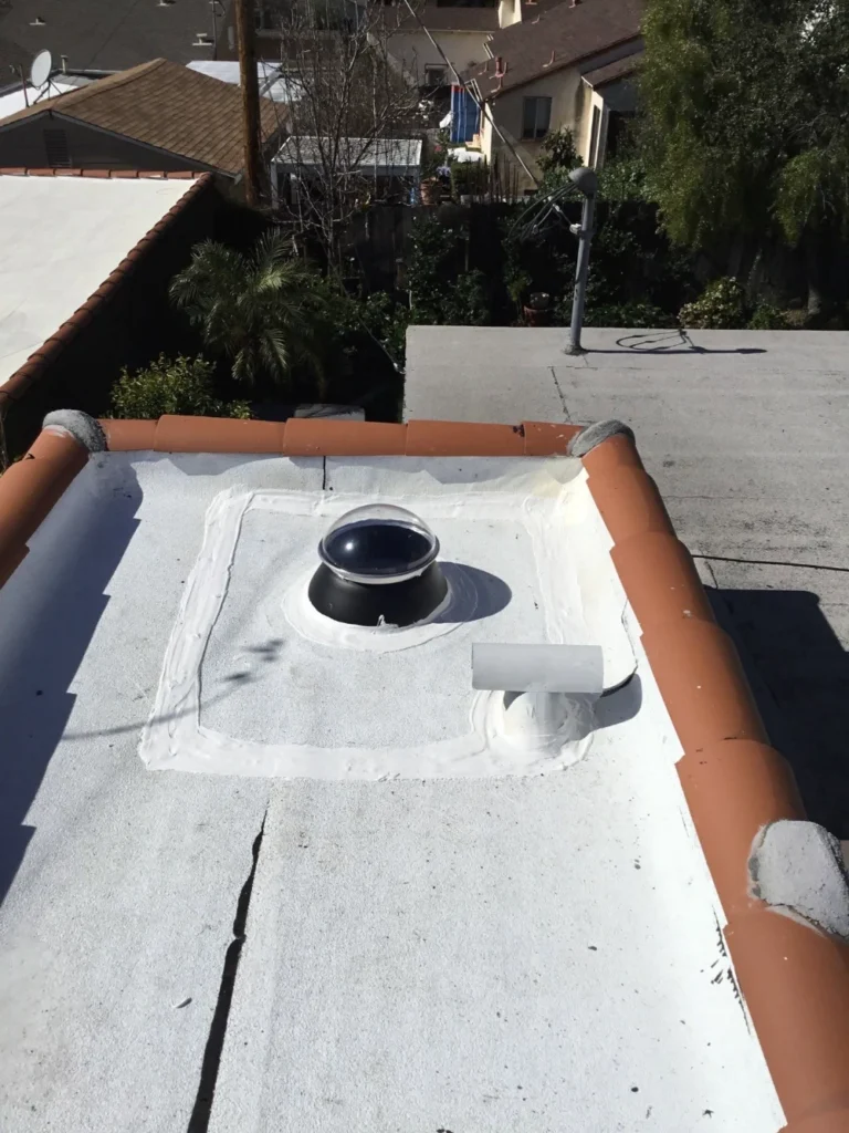 Should You Tarp a Leaking Flat Roof? Why This Common Advice Doesn’t Always Apply